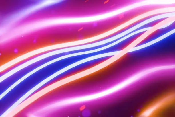 The image showcases a series of smooth, flowing lines that undulate across the canvas in a rhythmic pattern reminiscent of waves. These lines transition through a spectrum of colors, from deep purples to vibrant pinks, rich blues, and warm oranges, suggesting a seamless flow from one hue to the next.