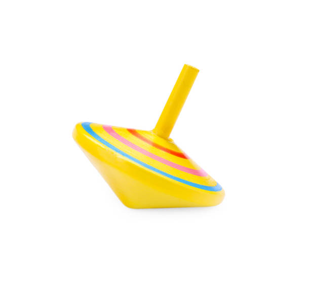 istock One bright spinning top isolated on white. Toy whirligig 1902989635