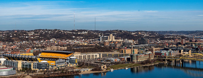 Pittsburgh, Pennsylvania, USA December 16, 2023 A partial view of the north side from Mt Washington with Acrisure Stadium and PNC Park along the Allegheny River on a sunny fall day