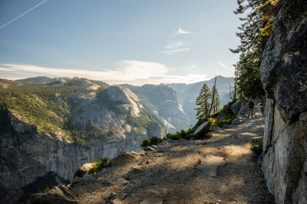 istock Hiker Looks Out From Four Mile Trail Looking Toward North Dome 1902996174