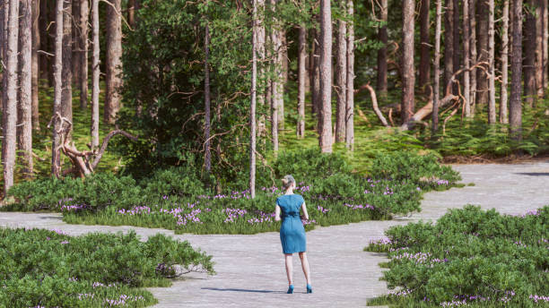 istock Direction for the Future: A Business Person Stands Before a Road 1902997228
