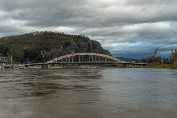 Flooded winter without snow river Labe with cloudy sky in Usti nad Labem CZ 12 25 2023