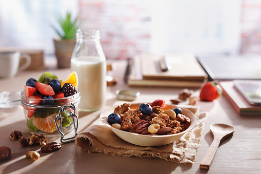 Breakfast with fruits, nuts and granola