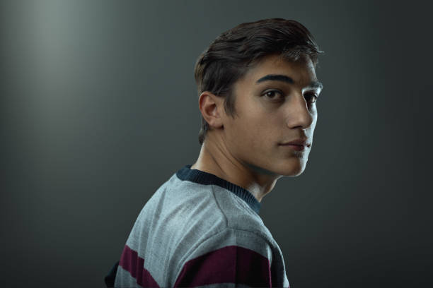 16 years-old teenager looking at camera