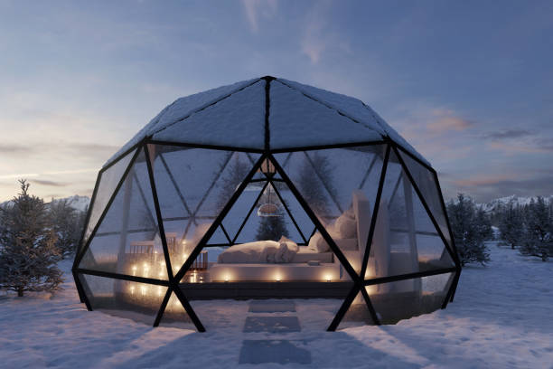 istock 3d rendering of geodesic dome hut with glass panels in a winter evening 1903225147