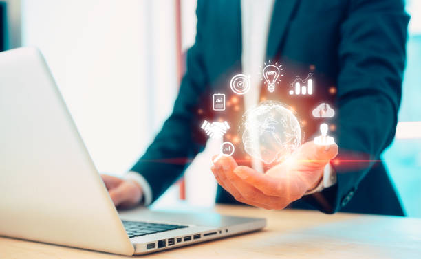 istock Digital transformation technology IoT, internet of things. AI technology global network concept. businessman working with computer laptop in modern office and holding virtual glob and tech icon 1903268167