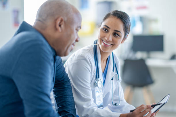 istock Doctor Talking with a Senior Patient 1903282243