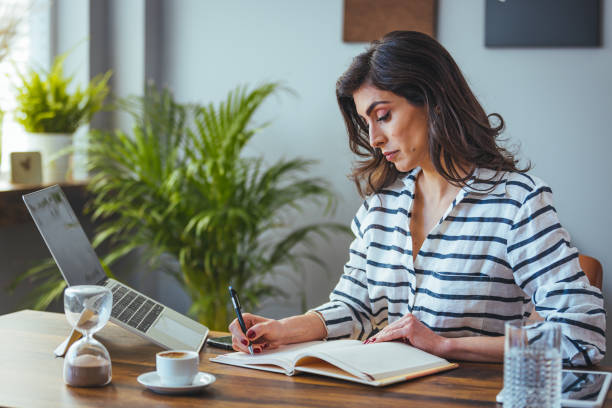 istock Mature older woman watching business training 1903282813