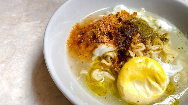 istock boiled instant noodles with spices and egg topping 1903282879