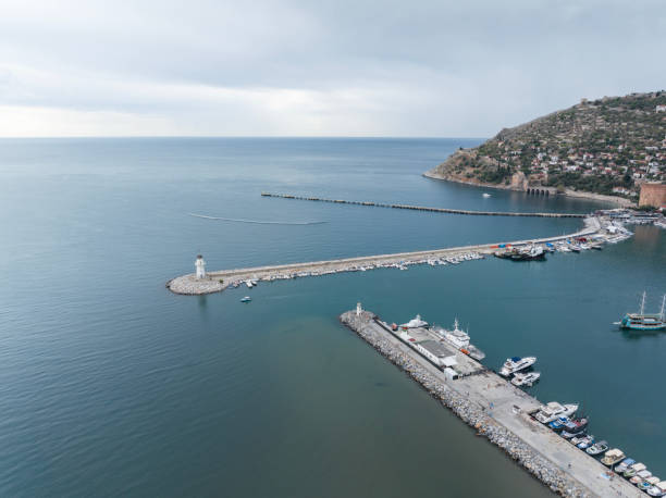 istock Lighthouse and Alanya Marina 1903444296