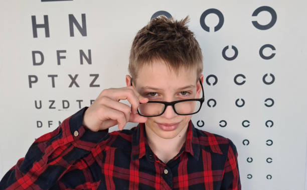 istock Handsome teenage boy is at ophthalmologist 1903447367
