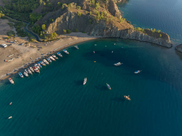 istock Yachts waiting on the beach 1903448379