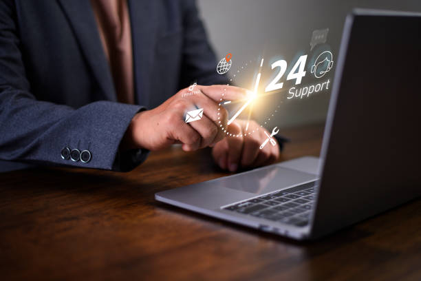 istock customer services and consulting concept, Businessman holding icon virtual 24/7 support services, Full-time available service. 1903558647