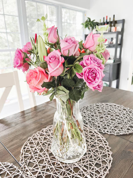 istock Bouquet of Pink Roses un Bright Dining Room 1903596908