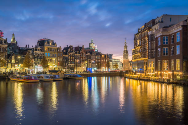 istock Evening waterfront of Amsterdam with city lights 1903602683