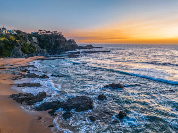 istock Sunrise seascape with high clouds 1903635011