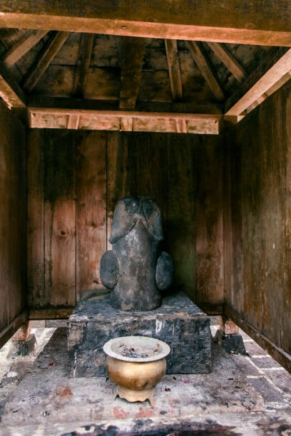 istock Statue and Prayer Incense Inside Cetho Temple In The Morning Clear Sky 1903661135