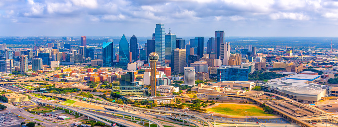 Aerial view of the beautiful modern skyline of Dallas, Texas shot via helicopter from an altitude of about 800 feet.