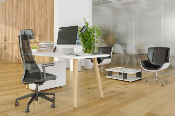 istock Empty CEO Office With Table, Desktop Computer, Office Chairs And Wooden Cabinet 1903688790