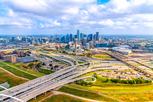 Aerial view of the beautiful modern skyline of Dallas, Texas shot via helicopter from an altitude of about 800 feet.