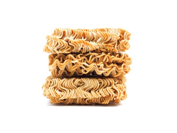 istock Blocks of dry instant noodles placed isolated on a white background. 1903698801