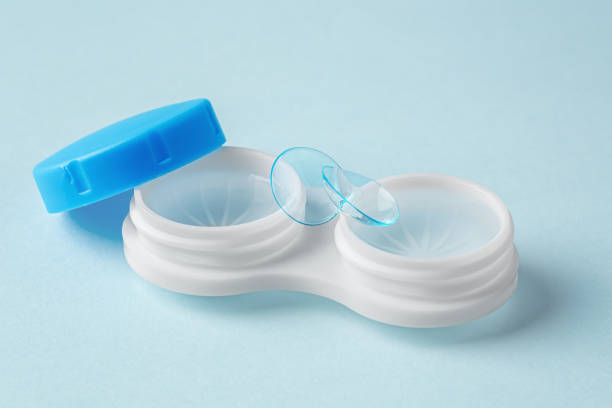 istock Contact lenses, closeup with case on light blue background 1903743037
