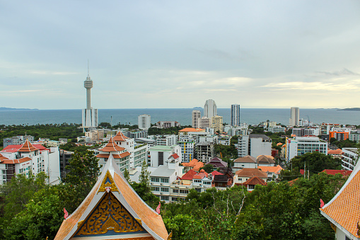 View on Pattaya from the Big Buddha statue, sunset, copy space for text