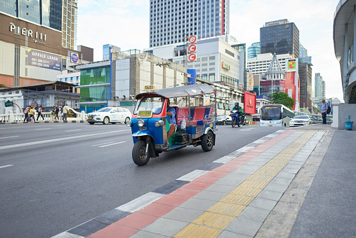 Bangkok, Thailand - Dec 04, 2023: Bangkok Tuk Tuk taxi car on the street