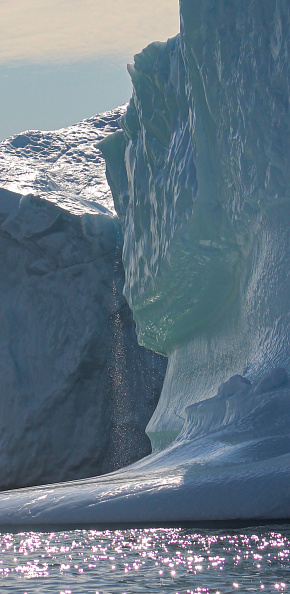A melting iceberg creates its own waterfall
