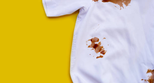 istock Dirty choclate stain on white shirt 1903920513