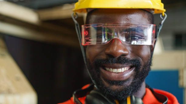 istock African American worker or engineer close up portrait in factory. 1903924749