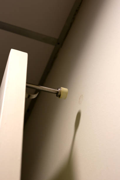 istock White door with door stopper 1903929257