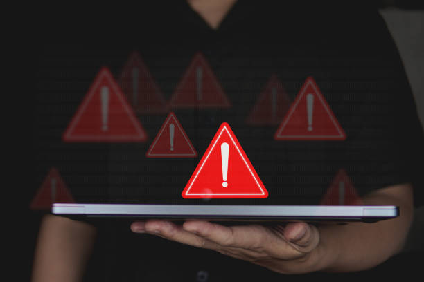 istock Emergency warning alert alarm on Smartphone, Data network protection, Virus alarm. 1903929549