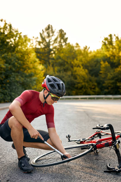 istock It needs to be fixed. confident man using tool while repairing bike outdoors 1903952890