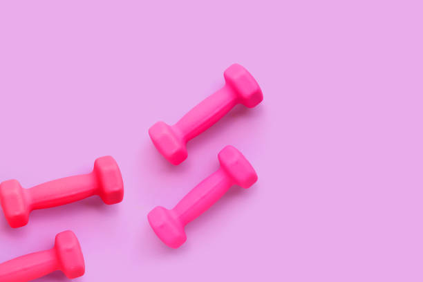 istock Top view of pink dumbbells 1903968564