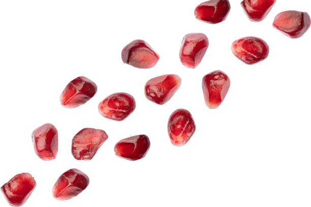 istock Ripe, red  and delicious pomegranate on white background 1903973267