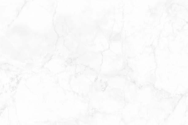 istock White grey marble seamless glitter texture background, counter top view of tile stone floor in natural pattern. 1903975863