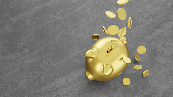 Savings, financial business and economy concept. Abstract golden coins falling in to the piggy bank.