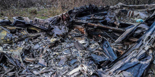 istock Burnt old boat on the shore 1903997195