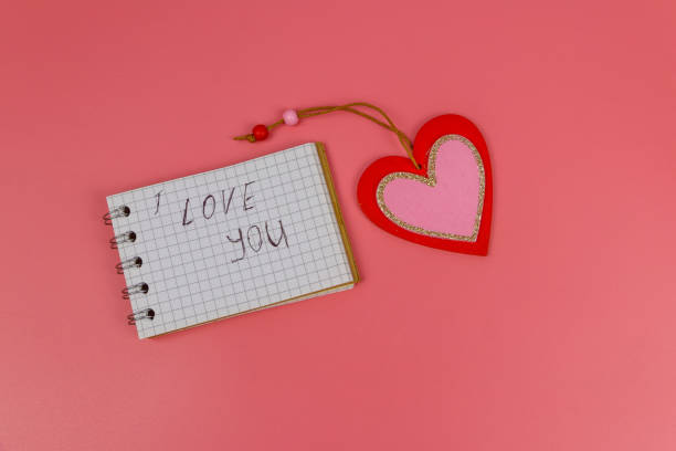 istock Heart and notepad with handwritten text 
