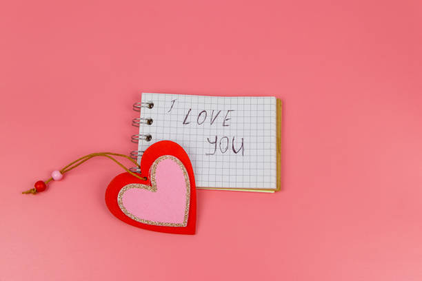 istock Heart and notepad with handwritten text 