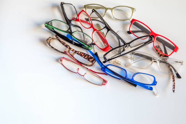 istock Broken eye strain glasses of different styles with space for text 1904020783