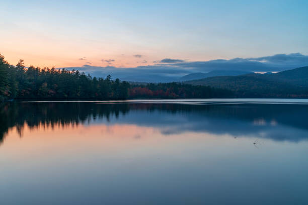 istock dusk sunlight and sky above lake in the mountain 1904032906