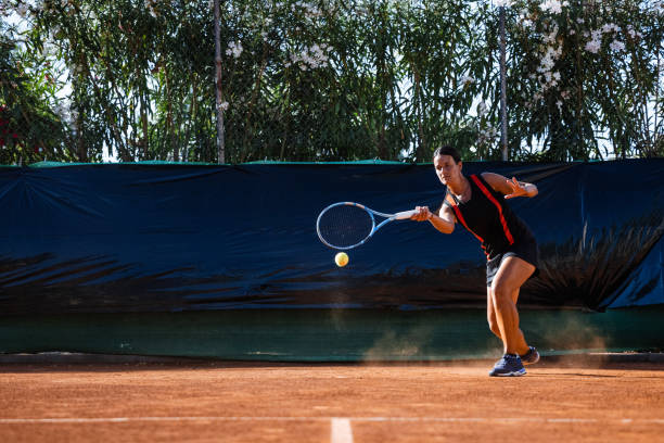 istock Tennis player on clay court 1904051968