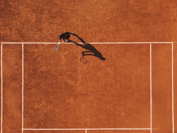 istock Bird-eye view of a tennis match 1904071285