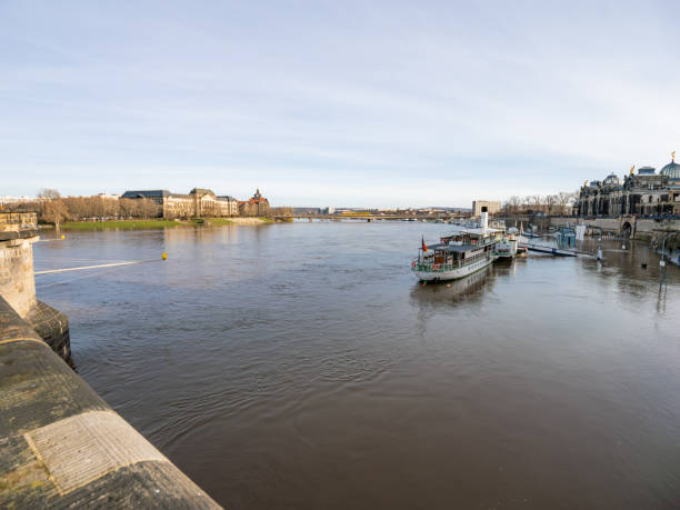 Dresden, Flooding of the Elbe river in the old town. Overflowed riverbanks caused by thawing water during the winter season. The extreme weather in the city is dangerous.