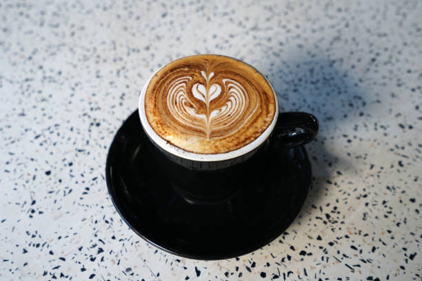 istock Close up ceramic cup of hot Latte coffee 1904097074