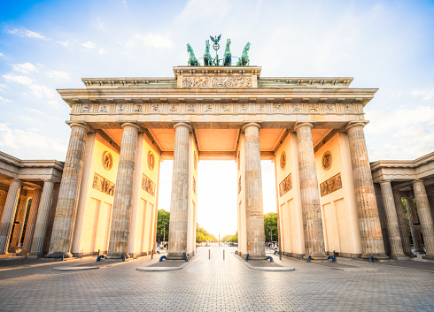 The Brandenburg Gate bathed in early evening sunlight on a sunny September day in Berlin, Germany.