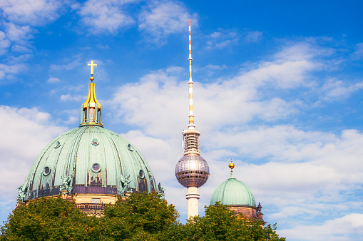 Two Berlin icons together - the domes of Berlin's cathedral in front of the TV Tower.