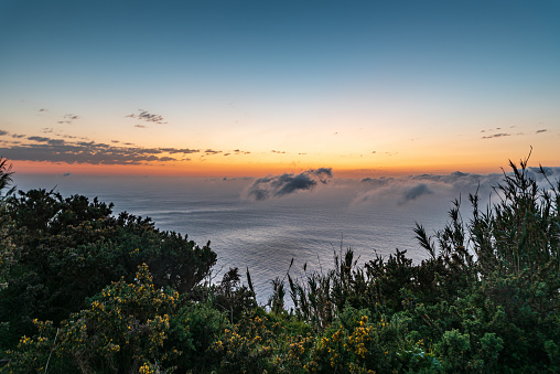 Atlantic ocean with few clouds above during sunset in Madeira - view from Ponta da Ladeira viewpoint near Porto Moniz